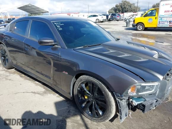 2014 Dodge Charger SRT-8 с VIN 2C3CDXEJ8EH205519, выставлен на аукционе IAAI как лот 41458330 с пробегом 74 558 миль миль и . История ставок и продаж доступна на DreamBid. Изображение 1.