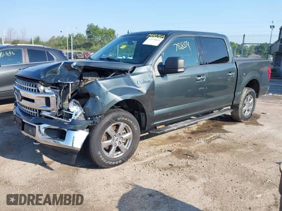 2018 Ford F-150 XLT z VIN 1FTEW1EG4JKC61072, wystawiony jako IAAI lot #42978854 z przebiegiem 126 442 mil mil oraz . Historia ofert i sprzedaży dostępna na DreamBid. Obrazek 17.