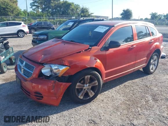 2010 Dodge Caliber SXT with VIN 1B3CB4HA4AD632362, listed as a IAAI auction lot 43130784 with 192,276 mi miles and . Bid and sale history available at DreamBid. Image 2.