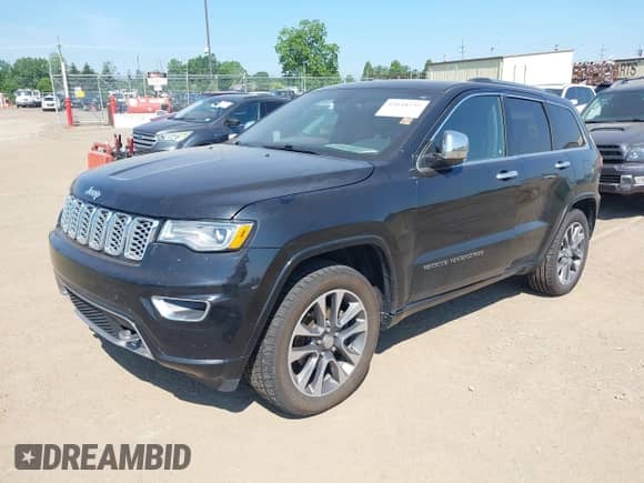 2017 Jeep Grand Cherokee Overland with VIN 1C4RJFCG1HC883343, listed as a IAAI auction lot 42644732 with 179,646 mi miles and . Bid and sale history available at DreamBid. Image 2.