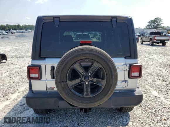 2023 Jeep Wrangler Willys with VIN 1C4HJXDG5PW653950, listed as a Copart auction lot 61857165 with 19,633 mi miles and Salvage title. Bid and sale history available at DreamBid. Image 6.