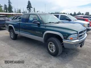 2000 Dodge Dakota Sport with VIN 1B7GG22N1YS703900, listed as a IAAI auction lot 42870370 with 129,892 mi miles and . Bid and sale history available at DreamBid. Image 1.