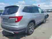 2022 Honda Pilot Elite z VIN 5FNYF6H08NB030669, wystawiony jako IAAI lot #42537378 z przebiegiem 70 169 mil mil oraz . Historia ofert i sprzedaży dostępna na DreamBid. Obrazek 4.