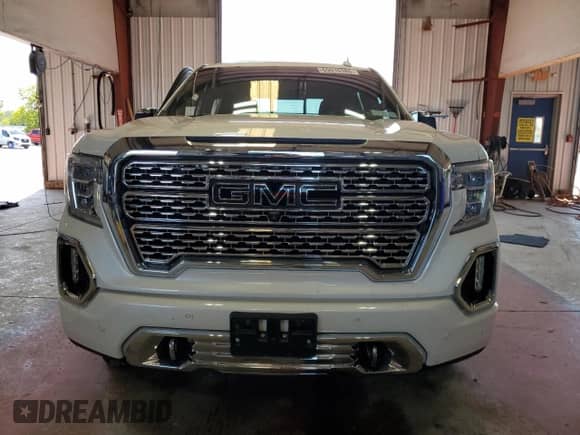 2019 GMC Sierra 1500 Denali с VIN 3GTU9FED8KG281016, выставлен на аукционе Copart как лот 69016385 с пробегом 52 021 миль миль и Списание • Salvage title. История ставок и продаж доступна на DreamBid. Изображение 5.