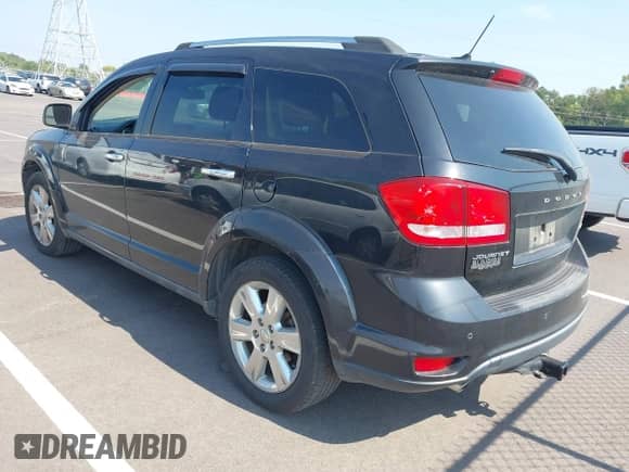 2012 Dodge Journey Crew with VIN 3C4PDCDG4CT231468, listed as a IAAI auction lot 43178465 with 250,483 mi miles and . Bid and sale history available at DreamBid. Image 3.