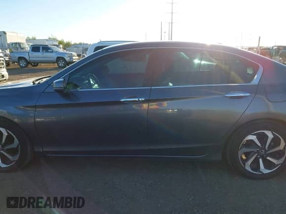 2017 Honda Accord EX-L with VIN 1HGCR2F88HA105291, listed as a IAAI auction lot 43581781 with 190,550 mi miles and . Bid and sale history available at DreamBid. Image 14.