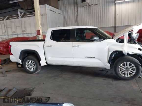 2025 Toyota Tundra SR with VIN 5TFLA5DB6SX270928, listed as a IAAI auction lot 43033077 with 8,337 mi miles and . Bid and sale history available at DreamBid. Image 14.