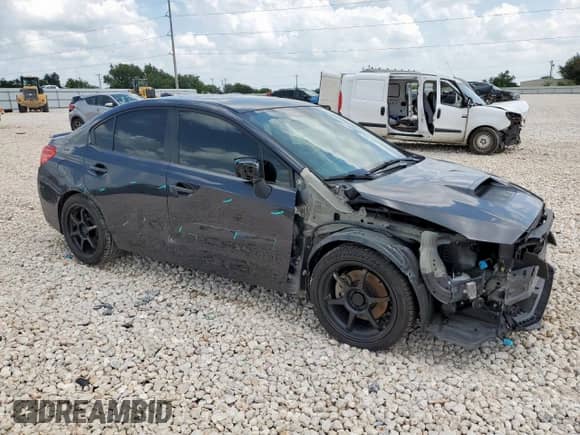 2016 Subaru WRX Premium with VIN JF1VA1E68G8823265, listed as a Copart auction lot 64818205 with 55,028 mi miles and Salvage title. Bid and sale history available at DreamBid. Image 4.
