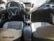 2013 Hyundai Veloster w/Black Int z VIN KMHTC6AD2DU099052, wystawiony jako Copart lot #60487975 z przebiegiem 126 762 mil mil oraz Czysty tytuł • Clean title. Historia ofert i sprzedaży dostępna na DreamBid. Obrazek 8.