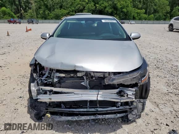 2024 Toyota Corolla LE with VIN 5YFB4MDE5RP214074, listed as a Copart auction lot 63408875 with 27,683 mi miles and Clean title. Bid and sale history available at DreamBid. Image 5.