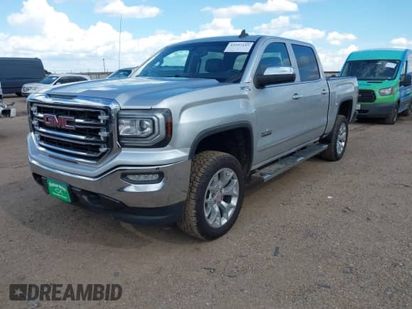 2018 GMC Sierra 1500 SLT z VIN 3GTU2NEC2JG556450, wystawiony jako IAAI lot #42597145 z przebiegiem 122 940 mil mil oraz . Historia ofert i sprzedaży dostępna na DreamBid. Obrazek 17.