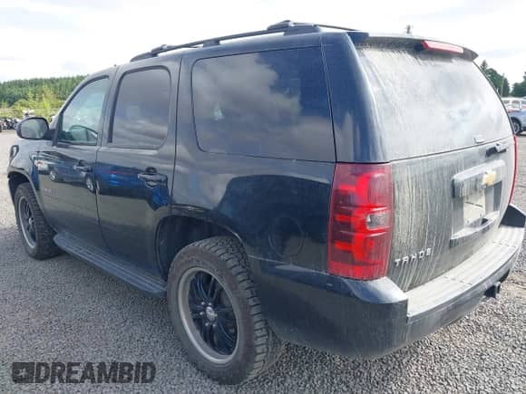 2013 Chevrolet Tahoe LS with VIN 1GNSKAE09DR234776, listed as a IAAI auction lot 42605423 with 200,433 mi miles and . Bid and sale history available at DreamBid. Image 3.