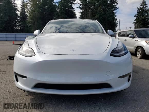 2020 Tesla Model Y Long Range с VIN 5YJYGDEE6LF023427, выставлен на аукционе Copart как лот 81877945 с пробегом 52 307 миль миль и Списание • Salvage title. История ставок и продаж доступна на DreamBid. Изображение 5.