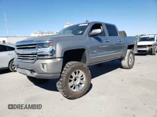2017 Chevrolet Silverado 1500 High Country с VIN 3GCPCTEC3HG342253, выставлен на аукционе Copart как лот 81157484 с пробегом Не указан миль и Списание • Salvage title. История ставок и продаж доступна на DreamBid. Изображение 1.