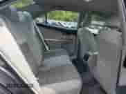 2013 Toyota Camry LE z VIN 4T1BD1FK0DU080437, wystawiony jako Copart lot #71326805 z przebiegiem 214 631 mil mil oraz Szkoda całkowita • Salvage title. Historia ofert i sprzedaży dostępna na DreamBid. Obrazek 10.