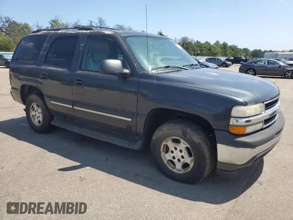 2005 Chevrolet Tahoe LS с VIN 1GNEC13TX5J171758, выставлен на аукционе Copart как лот 64902515 с пробегом 165 888 миль миль и Чистый • Clean title. История ставок и продаж доступна на DreamBid. Изображение 4.