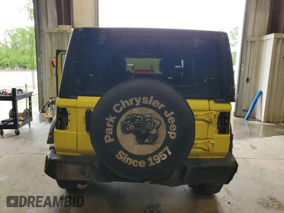 2023 Jeep Wrangler Willys with VIN 1C4HJXDG0PW653712, listed as a Copart auction lot 58603245 with 66,598 mi miles and Salvage title. Bid and sale history available at DreamBid. Image 6.