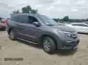 2022 Honda Pilot EX-L with VIN 5FNYF6H57NB003510, listed as a Copart auction lot 62173115 with 30,751 mi miles and Salvage title. Bid and sale history available at DreamBid. Image 4.