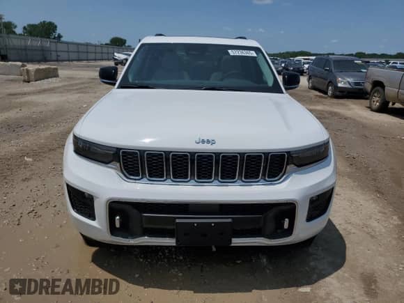 2023 Jeep Grand Cherokee Overland z VIN 1C4RJHDG2PC579835, wystawiony jako Copart lot #57236365 z przebiegiem 7 153 mil mil oraz Szkoda całkowita • Salvage title. Historia ofert i sprzedaży dostępna na DreamBid. Obrazek 5.