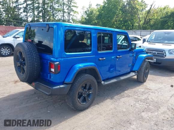 2022 Jeep Wrangler Unlimited Sahara with VIN 1C4HJXEN0NW207960, listed as a IAAI auction lot 42746690 with 79,779 mi miles and . Bid and sale history available at DreamBid. Image 4.