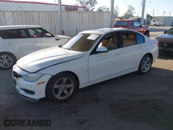 2015 BMW 3 Series 328i with VIN WBA3C1C51FK118148, listed as a IAAI auction lot 43126893 with 140,556 mi miles and . Bid and sale history available at DreamBid. Image 16.