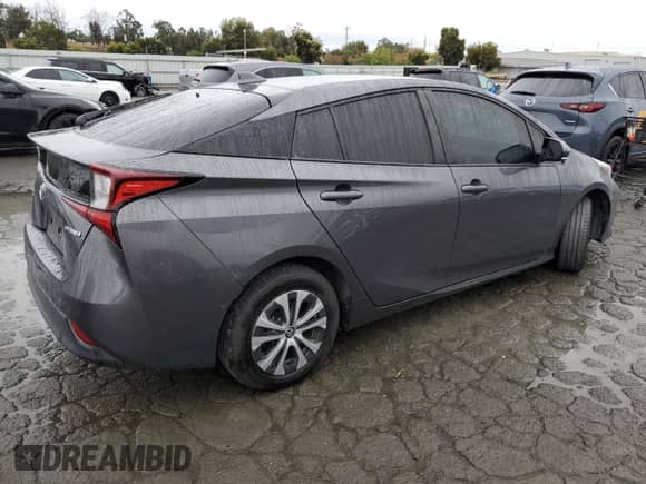 2019 Toyota Prius LE с VIN JTDL9RFU4K3011215, выставлен на аукционе Copart как лот 82524815 с пробегом 130 204 миль миль и Списание • Salvage title. История ставок и продаж доступна на DreamBid. Изображение 3.