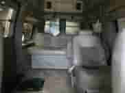 2004 Chevrolet Express Passenger z VIN 1GBFG15T441151958, wystawiony jako Copart lot #67174135 z przebiegiem Nie podano mil oraz Szkoda całkowita • Salvage title. Historia ofert i sprzedaży dostępna na DreamBid. Obrazek 10.