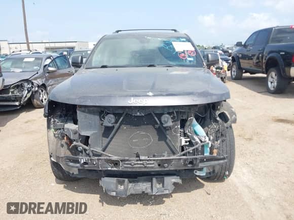 2020 Jeep Grand Cherokee Laredo E with VIN 1C4RJEAG2LC284912, listed as a IAAI auction lot 42114881 with 86,579 mi miles and . Bid and sale history available at DreamBid. Image 13.