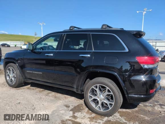 2019 Jeep Grand Cherokee Overland z VIN 1C4RJFCT8KC635899, wystawiony jako Copart lot #61304775 z przebiegiem 79 461 mil mil oraz Szkoda całkowita • Salvage title. Historia ofert i sprzedaży dostępna na DreamBid. Obrazek 2.