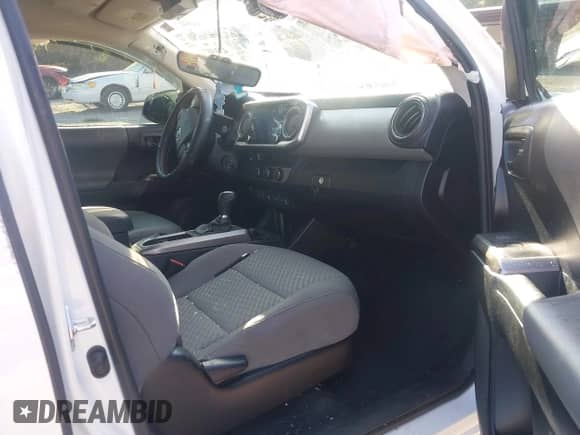 2021 Toyota Tacoma SR5 with VIN 3TMAZ5CN8MM152710, listed as a IAAI auction lot 43148239 with 40,000 mi miles and . Bid and sale history available at DreamBid. Image 5.