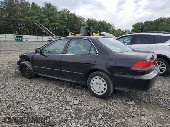 2001 Honda Accord LX с VIN 1HGCG665X1A060489, выставлен на аукционе Copart как лот 63581825 с пробегом 181 887 миль миль и Списание • Salvage title. История ставок и продаж доступна на DreamBid. Изображение 2.