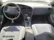 1995 Toyota Camry LE с VIN 4T1GK12E2SU087124, выставлен на аукционе Copart как лот 61196345 с пробегом 98 578 миль миль и Чистый • Clean title. История ставок и продаж доступна на DreamBid. Изображение 8.