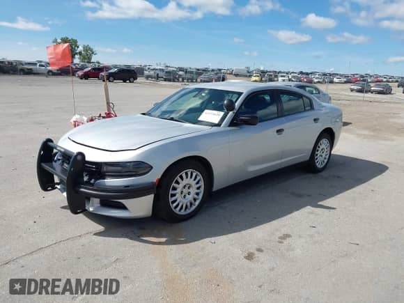 2020 Dodge Charger Police z VIN 2C3CDXKTXLH124217, wystawiony jako IAAI lot #43154620 z przebiegiem 119 464 mil mil oraz . Historia ofert i sprzedaży dostępna na DreamBid. Obrazek 18.