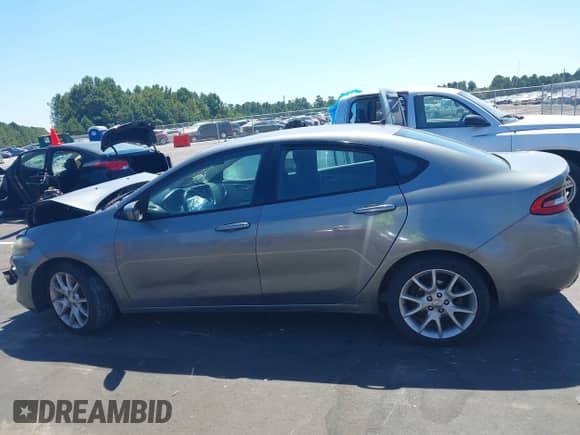 2013 Dodge Dart SXT with VIN 1C3CDFBA4DD294340, listed as a IAAI auction lot 43142721 with 185,842 mi miles and . Bid and sale history available at DreamBid. Image 14.