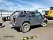 1996 Honda Passport LX с VIN 4S6CM58V1T4405007, выставлен на аукционе Copart как лот 71560165 с пробегом 257 446 миль миль и Списание • Salvage title. История ставок и продаж доступна на DreamBid. Изображение 3.