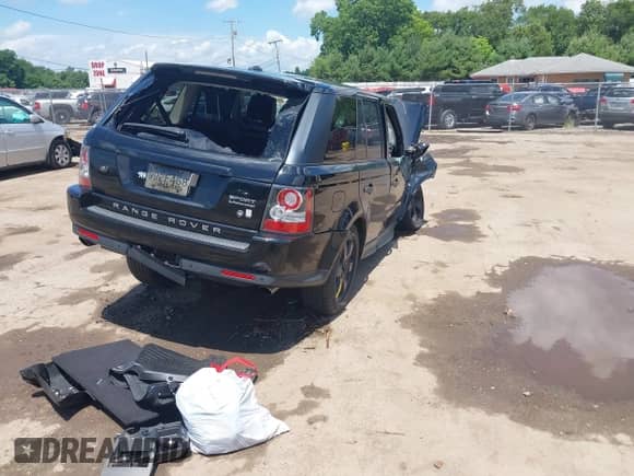 2011 Land Rover Range Rover Sport SC with VIN SALSH2E43BA283377, listed as a IAAI auction lot 42611414 with 107,000 mi miles and . Bid and sale history available at DreamBid. Image 4.