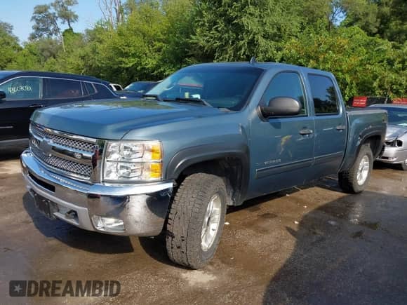 2013 Chevrolet Silverado 1500 LT with VIN 3GCPKSE74DG202044, listed as a IAAI auction lot 43017136 with 145,988 mi miles and . Bid and sale history available at DreamBid. Image 2.