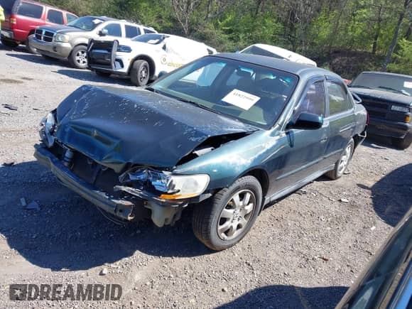 2001 Honda Accord LX with VIN 1HGCG56411A034459, listed as a IAAI auction lot 42248215 with 179,408 mi miles and . Bid and sale history available at DreamBid. Image 2.