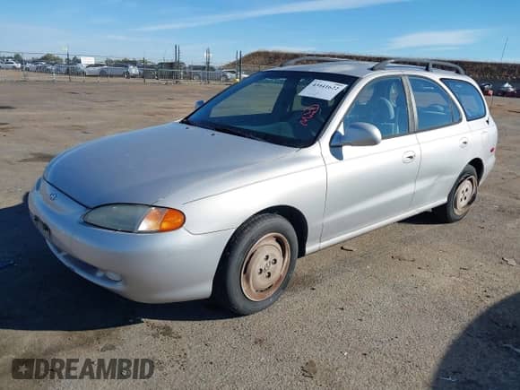1998 Hyundai Elantra with VIN KMHJW34M6WU114857, listed as a IAAI auction lot 43441622 with 163,604 mi miles and . Bid and sale history available at DreamBid. Image 2.