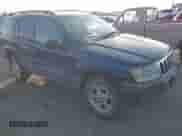 2002 Jeep Grand Cherokee Sport with VIN 1J4GW38S32C181840, listed as a IAAI auction lot 43237876 with 157,878 mi miles and . Bid and sale history available at DreamBid. Image 1.