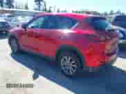 2023 Mazda CX-5 S Preferred z VIN JM3KFBCM4P0169974, wystawiony jako IAAI lot #42664578 z przebiegiem 54 908 mil mil oraz . Historia ofert i sprzedaży dostępna na DreamBid. Obrazek 3.