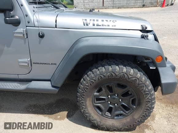 2015 Jeep Wrangler Sport with VIN 1C4AJWAG2FL507778, listed as a IAAI auction lot 42665428 with 126,554 mi miles and . Bid and sale history available at DreamBid. Image 19.