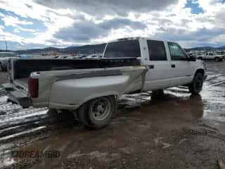 1999 Chevrolet Silverado 3500 с VIN 1GCHC33J2XF087634, выставлен на аукционе Copart как лот 58106714 с пробегом 205 431 миль миль и Чистый • Clean title. История ставок и продаж доступна на DreamBid. Изображение 3.