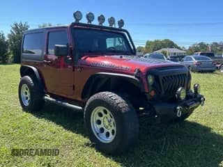 2012 Jeep Wrangler Sport с VIN 1C4AJWAG7CL105511, выставлен на аукционе Copart как лот 80135395 с пробегом 137 564 миль миль и Чистый • Clean title. История ставок и продаж доступна на DreamBid. Изображение 1.