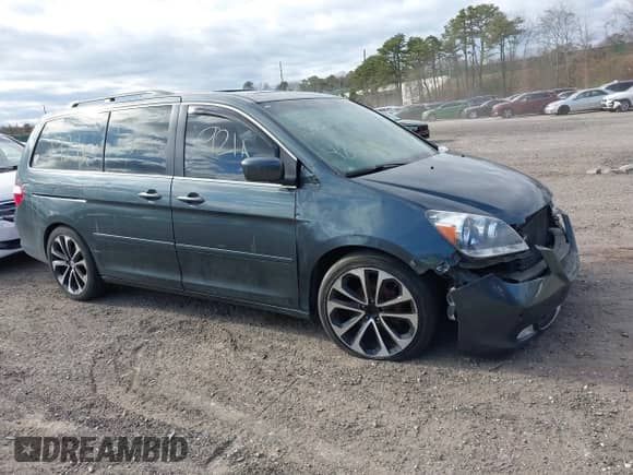 2006 Honda Odyssey Touring z VIN 5FNRL38896B083044, wystawiony jako IAAI lot #42061058 z przebiegiem Nie podano mil oraz . Historia ofert i sprzedaży dostępna na DreamBid. Obrazek 1.