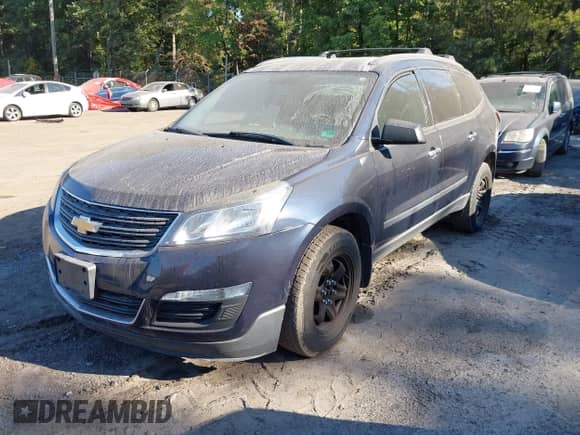 2015 Chevrolet Traverse LS z VIN 1GNKVFED6FJ293826, wystawiony jako IAAI lot #43148870 z przebiegiem 202 889 mil mil oraz . Historia ofert i sprzedaży dostępna na DreamBid. Obrazek 2.