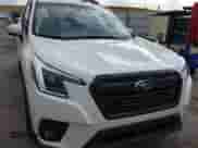 2023 Subaru Forester Premium z VIN JF2SKADCXPH404322, wystawiony jako Copart lot #71326745 z przebiegiem 22 627 mil mil oraz Szkoda całkowita • Salvage title. Historia ofert i sprzedaży dostępna na DreamBid. Obrazek 14.