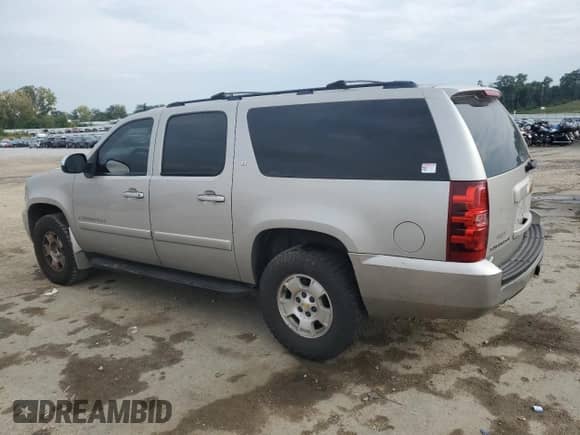 2007 Chevrolet Suburban LTZ с VIN 1GNFC16077R388601, выставлен на аукционе Copart как лот 81522175 с пробегом 162 051 миль миль и Чистый • Clean title. История ставок и продаж доступна на DreamBid. Изображение 2.