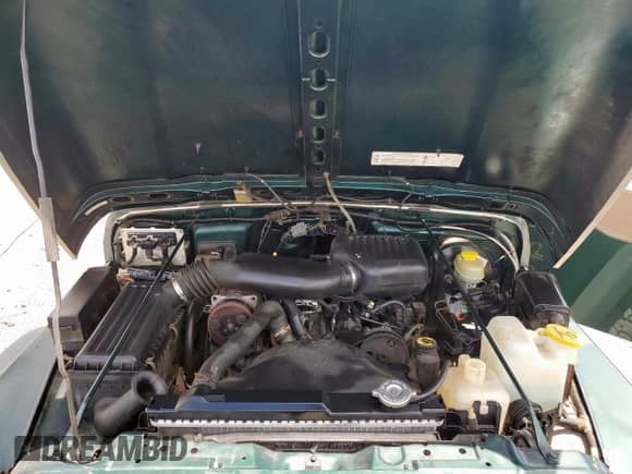 2000 Jeep Wrangler SE with VIN 1J4FA29P2YP800721, listed as a Copart auction lot 67490145 with 128,182 mi miles and Clean title. Bid and sale history available at DreamBid. Image 11.