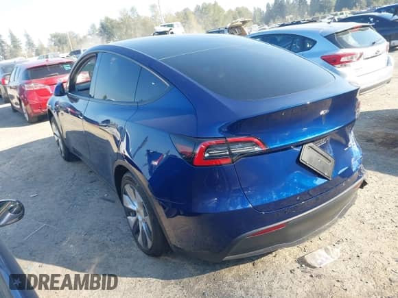 2023 Tesla Model Y Long Range with VIN 7SAYGDEE3PF957974, listed as a IAAI auction lot 43275987 with 20,712 mi miles and . Bid and sale history available at DreamBid. Image 3.
